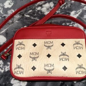 MCM cross body bag . Never used .